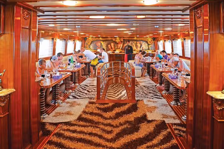 Luxury pirate boat dining salon with buffet lunch on Sharm Ras Mohammed and White Island sailing trip