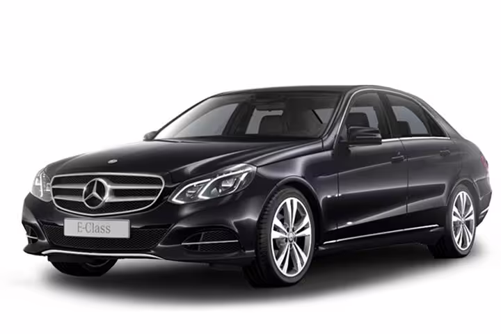 Luxury black car for private tours in Alba, emphasizing comfort and style for wine and truffle experiences.