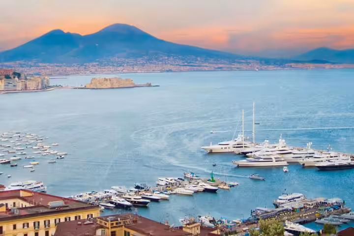 Luxury sedan private transfer Naples to Amalfi Coast, professional chauffeur service with door-to-door pickup