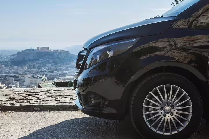 Luxury private transfer van on Athens viewpoint, ideal for Ancient Corinth, Hera Temple and Blue Lake tour