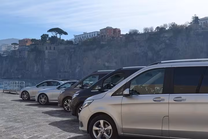 Fleet of luxury vehicles ready for private transfers along the scenic Sorrento to Positano route.
