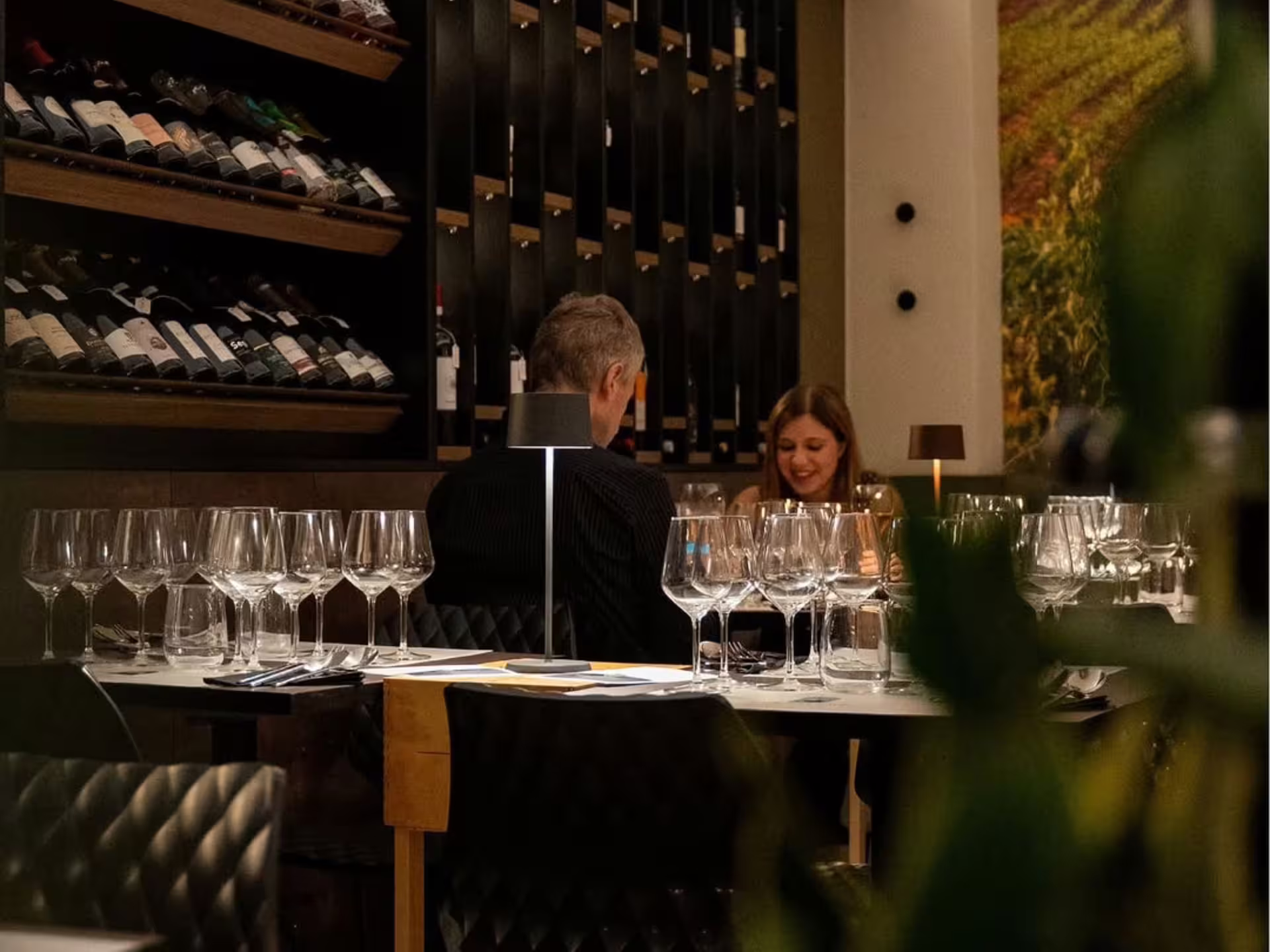 Elegant Modena city center wine bar set for a luxury guided wine tasting with curated Italian bottles