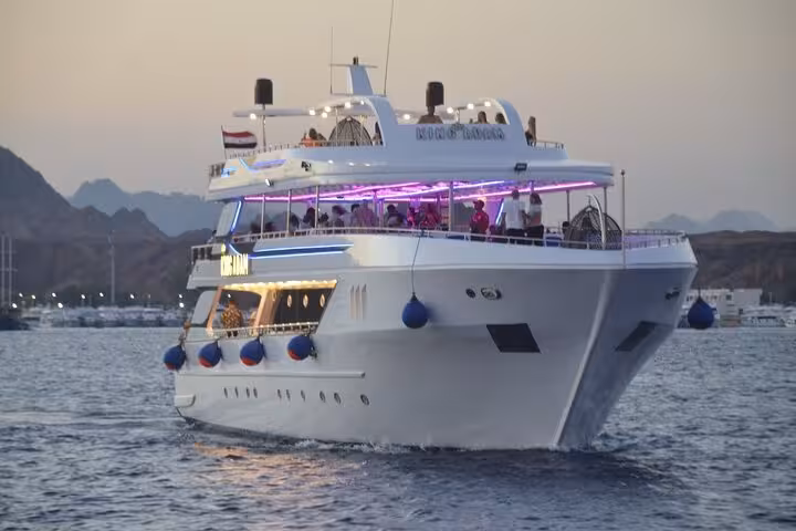 Luxury yacht at sunset for Sharm El Sheikh evening oriental dinner cruise with belly dance show onboard