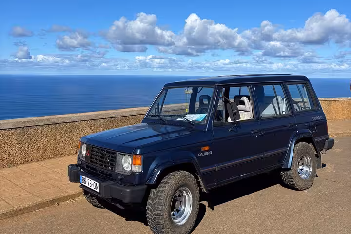 4x4 jeep at a Madeira coastal viewpoint, ready for a southwest cultural and geological off-road adventure