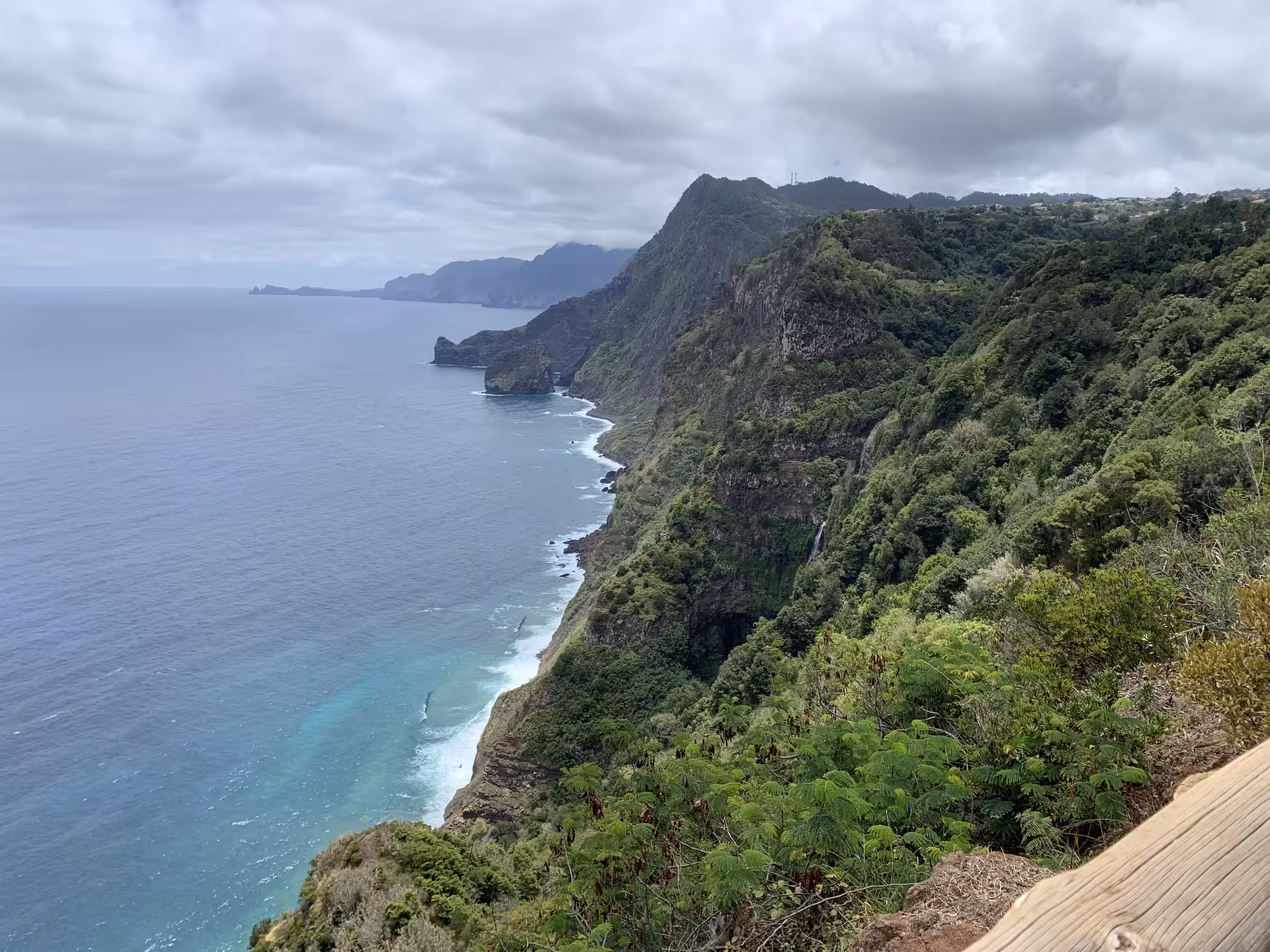 Stunning Madeira north coast cliffside with waterfall and turquoise Atlantic Ocean on a private small group tour