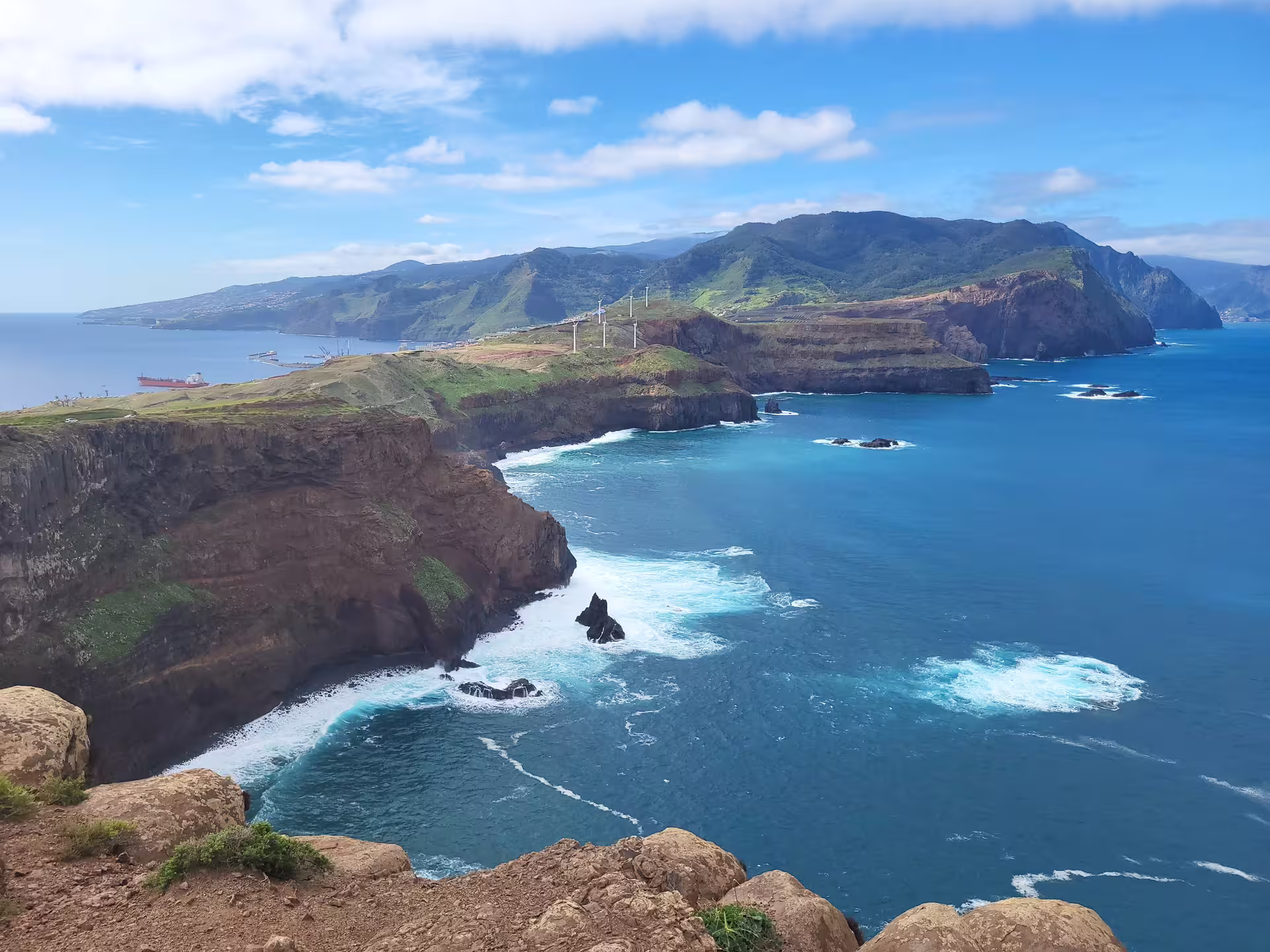 Stunning coastal cliffs and azure waters of Madeira, perfect for a private tour exploring natural beauty in total comfort.