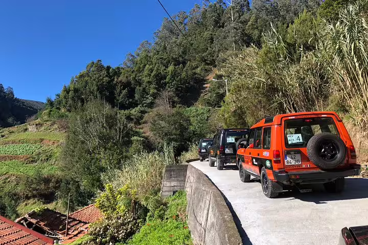 Explore the lush landscapes of Madeira's east in a thrilling safari adventure with rugged 4x4 vehicles and scenic views.
