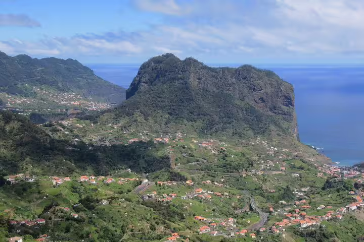Breathtaking view of Madeira's lush green valleys and dramatic peaks, ideal for the Santana & Peaks 4x4 adventure tour.
