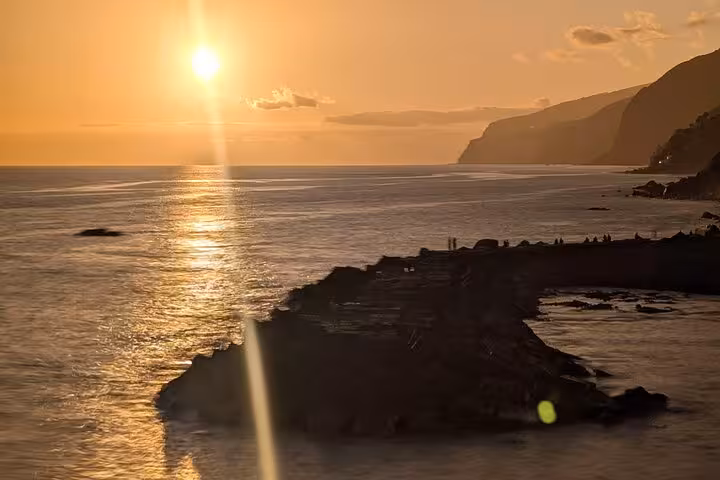 Sunset over Madeira’s rugged west coast and lava pools, a scenic stop on the West Madeira 4x4 expedition