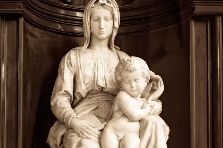 Michelangelo's Madonna of Bruges marble sculpture showing Virgin Mary seated with infant Jesus