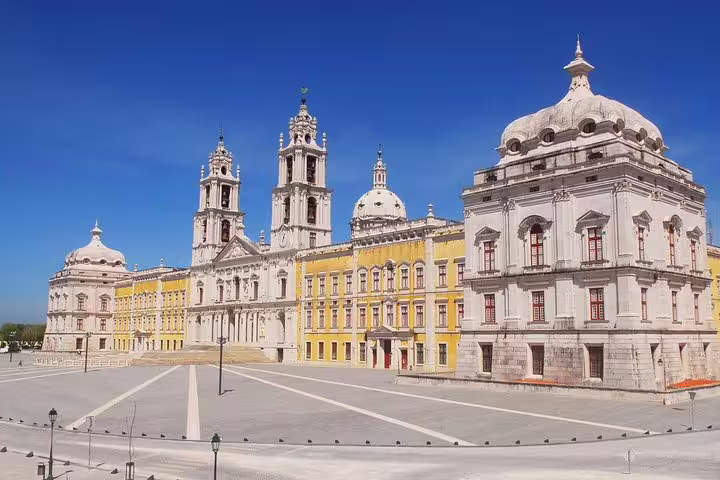 The grand Mafra National Palace with its baroque architecture, seen on the Tomar and Mafra Small Group Tour from Lisbon.