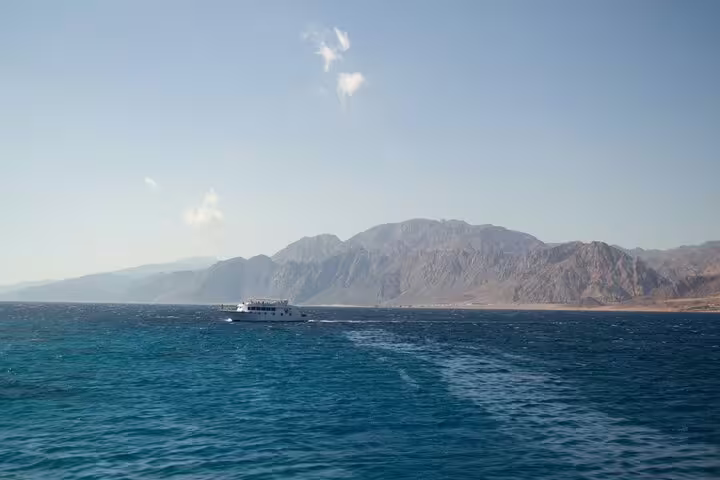 Boat cruising the Red Sea to Mahmya Island from Hurghada, Egypt, for a full-day snorkeling excursion