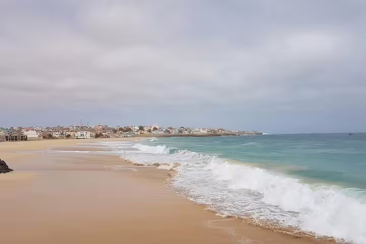 Maio Island sandy beach and turquoise Atlantic waves, scenic stop on guided Maio tour with lunch in Cape Verde