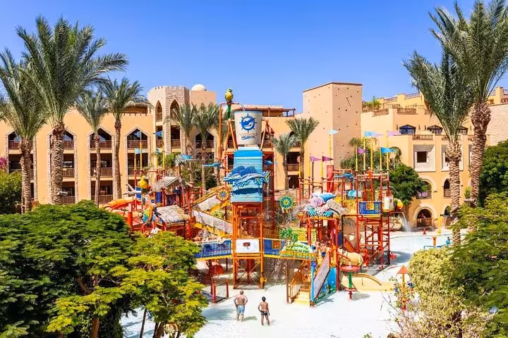 Family splash zone at Makadi Water World Aqua Park in Hurghada with kids play towers and pools