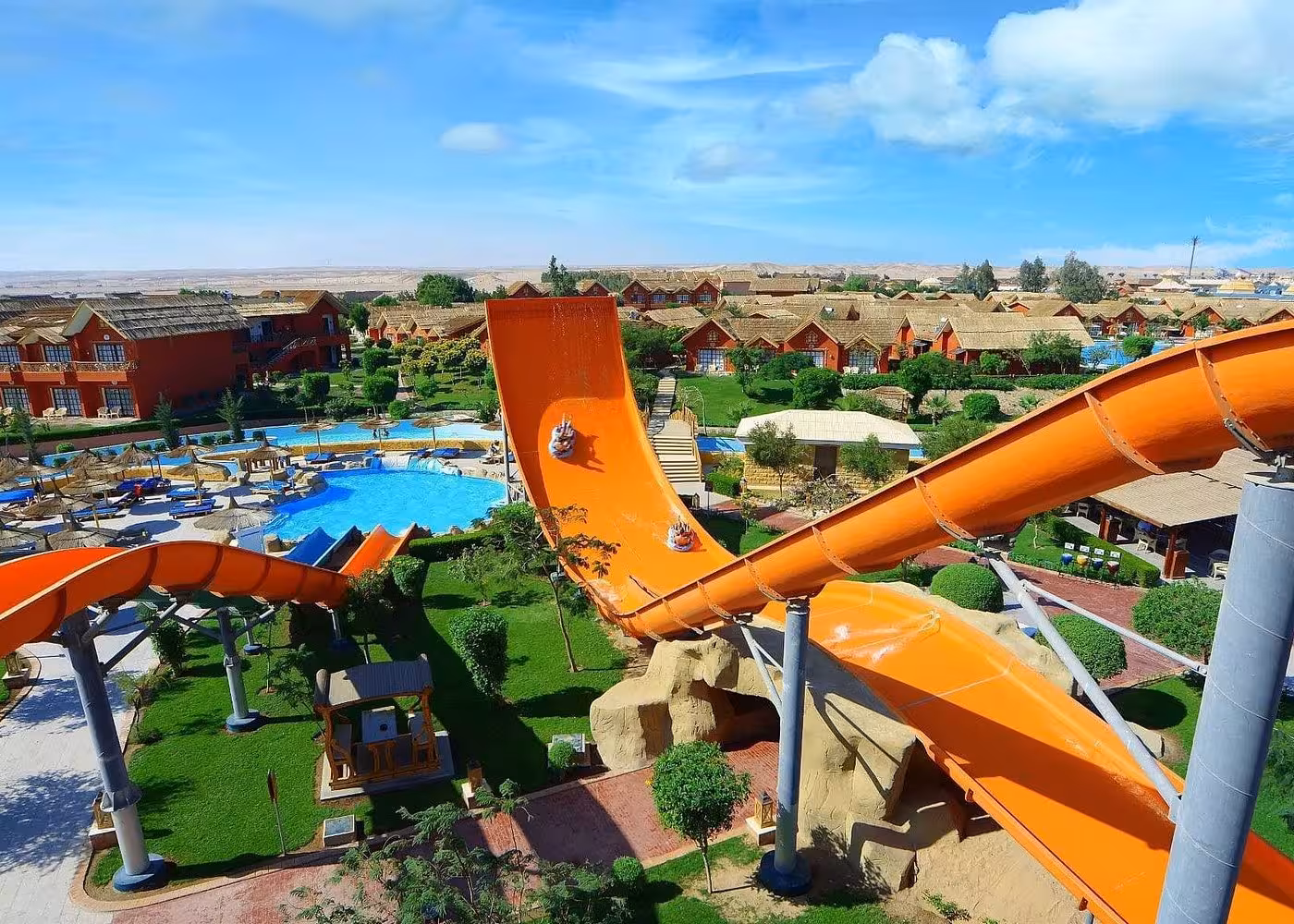 Thrilling orange water slide at Makadi Water World near Hurghada, part of aqua park tour with lunch included