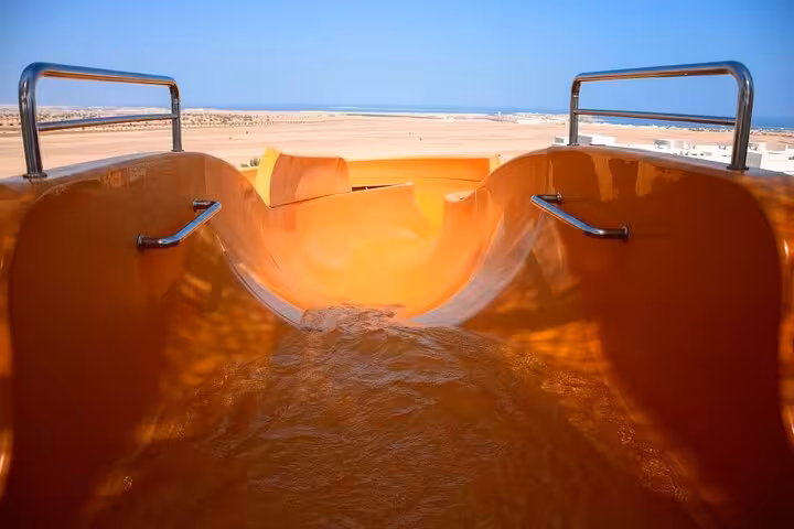 Orange water slide at Makadi Water World near Hurghada, part of day trip with lunch and hotel transfers