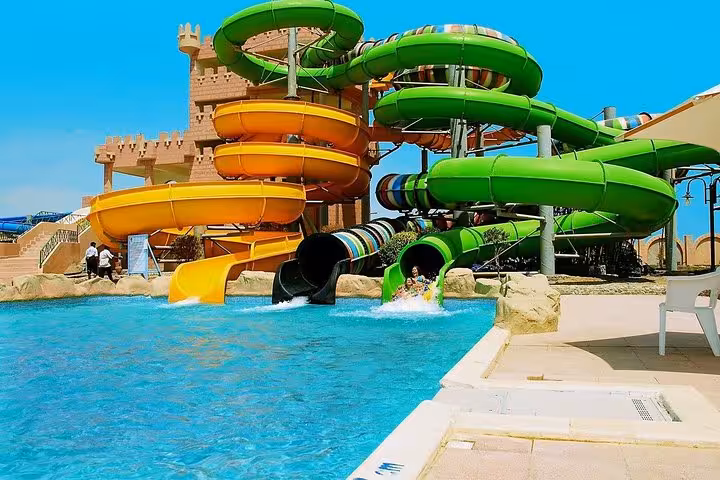 Colorful spiral tube slides and pool at Makadi Water World aqua park day trip from Hurghada, El Gouna, Makadi