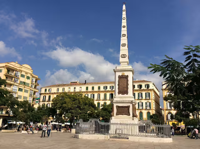 Plaza de la Merced obelisk in Malaga, a key stop on Malaga and Mijas private full-day trip with hotel pickup