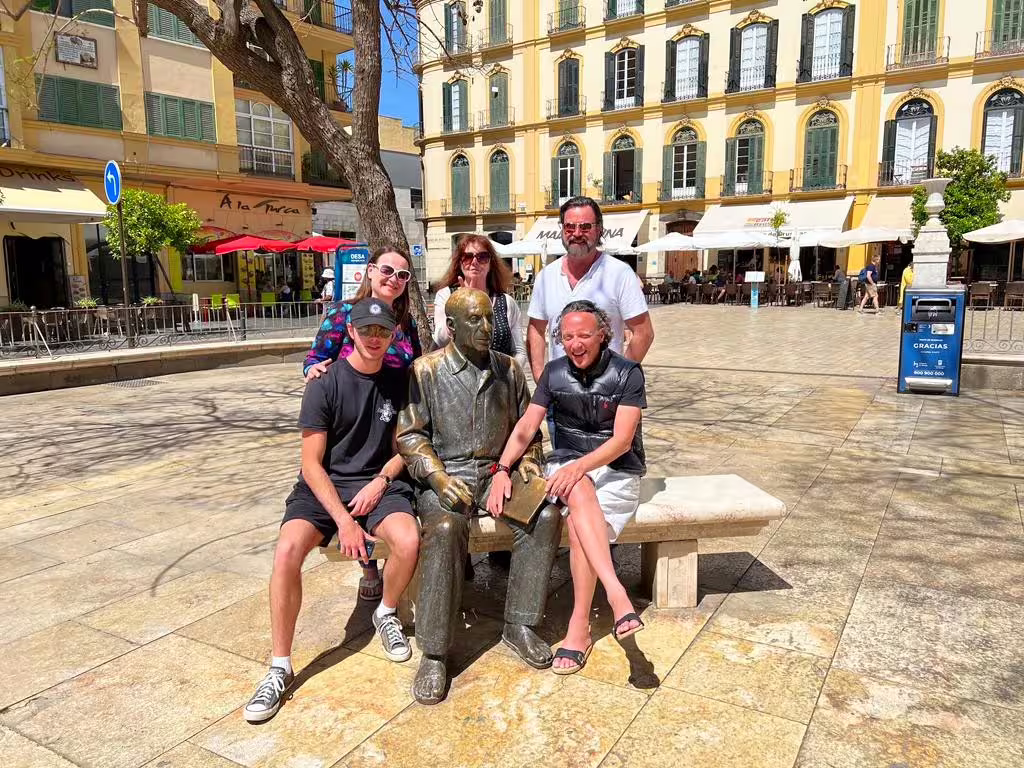 Travelers at Plaza de la Merced Malaga on a private Malaga and Mijas day trip with hotel pick-up