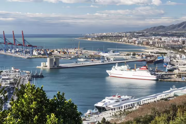 View of Malaga Port with cruise ships ready for exclusive tours to Granada and the Alhambra, ideal for cruise passengers.