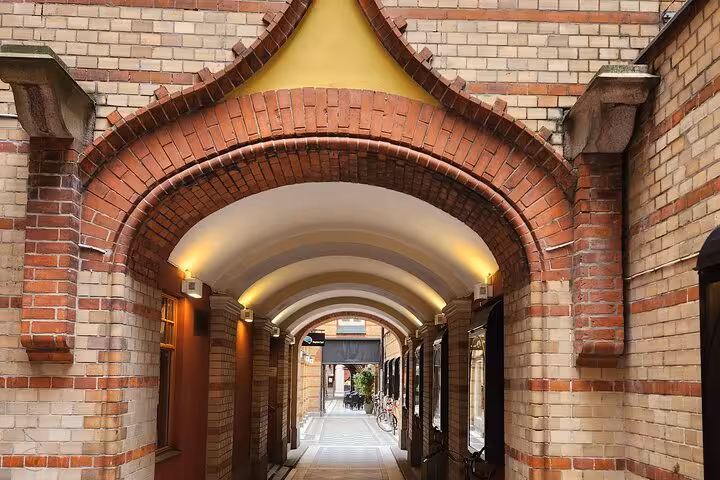 Charming brick archway in Malmo's historic district on a guided highlights tour.