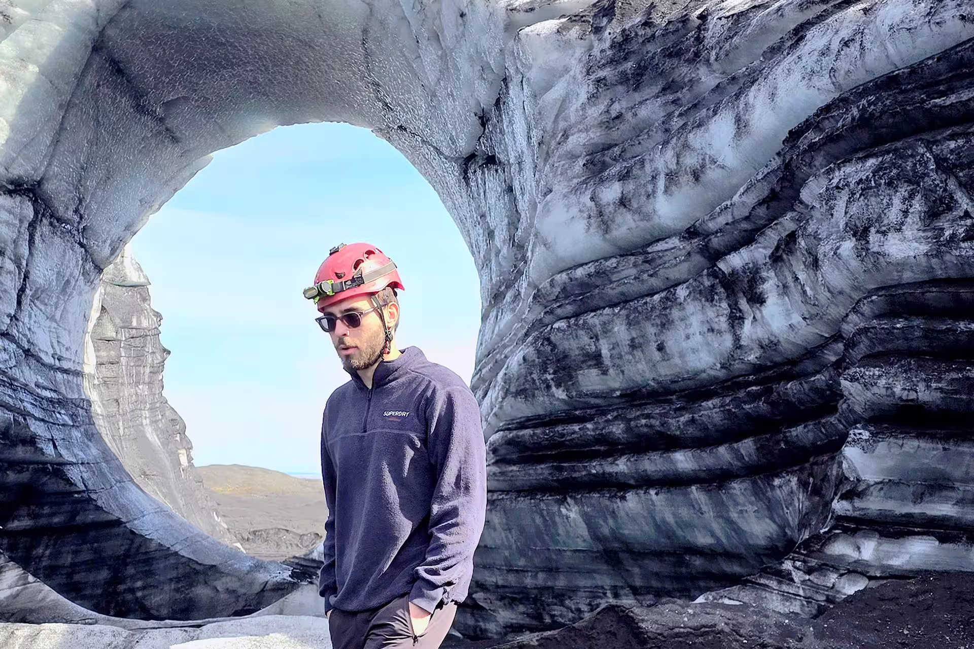 Man inside an ice cave.