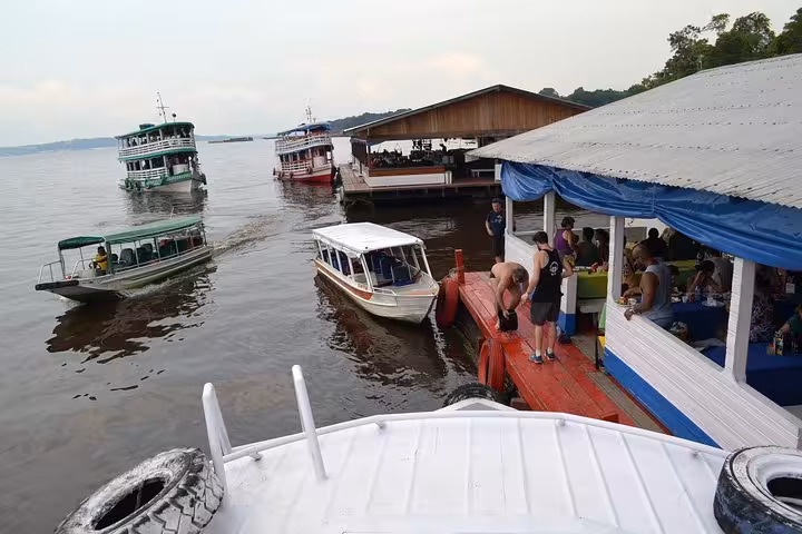 Boats at Manaus river pier for Amazon Negro River half-day expedition tour and Meeting of Waters