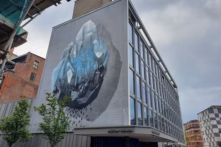 Large crystal formation mural on Hilton House building facade, Manchester street art