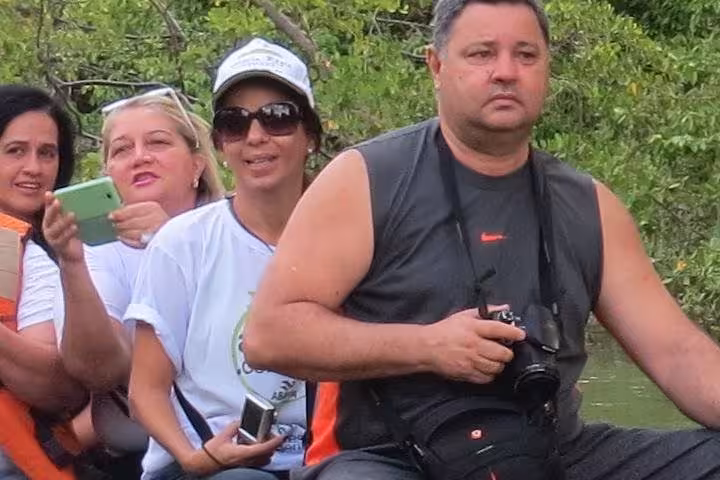 Travelers on a small boat through Marajó Island mangroves, part of the 3-day Amazon Delta tour from Belém