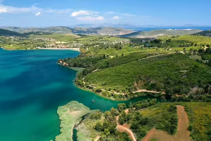 Scenic view of Marathon Lake near Athens, lush hills and turquoise water on a half-day ancient path tour