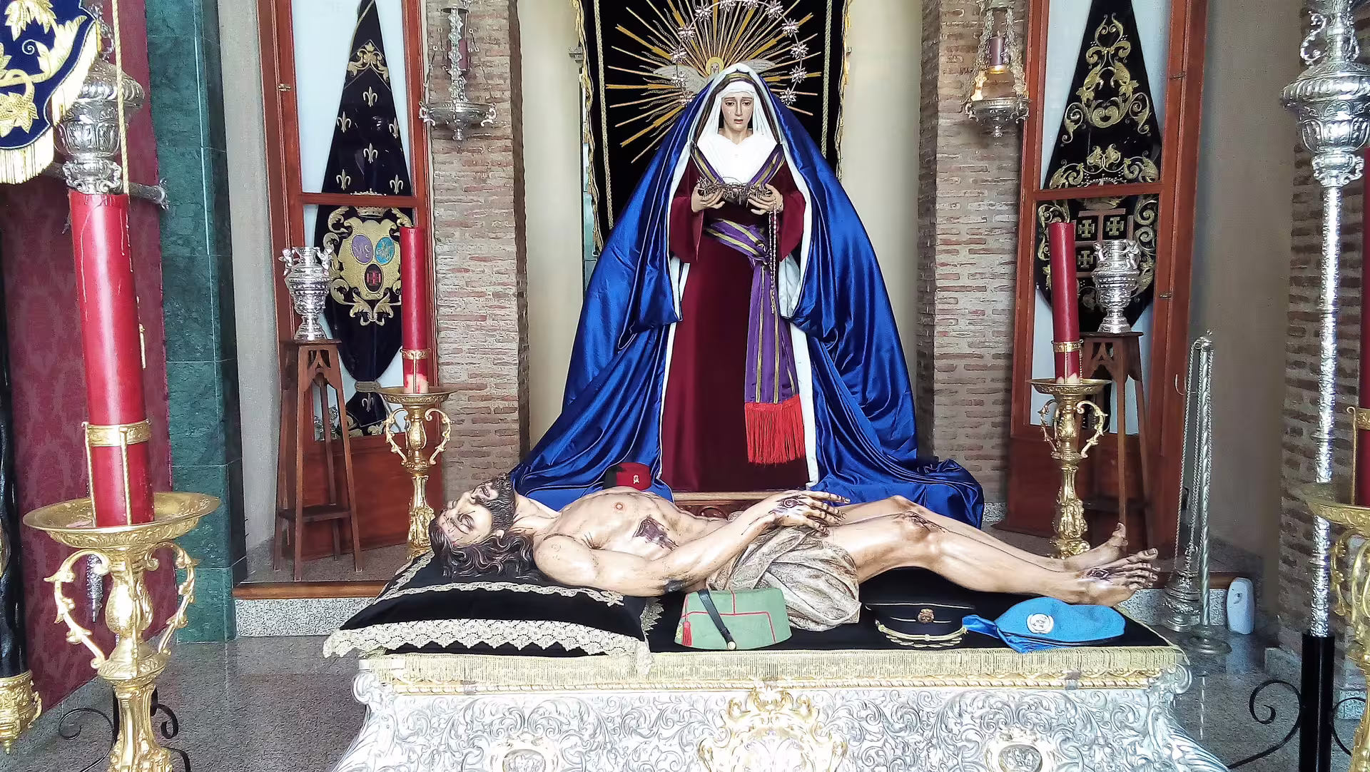 Religious statue display inside a Marbella church, a cultural highlight on a group walking tour