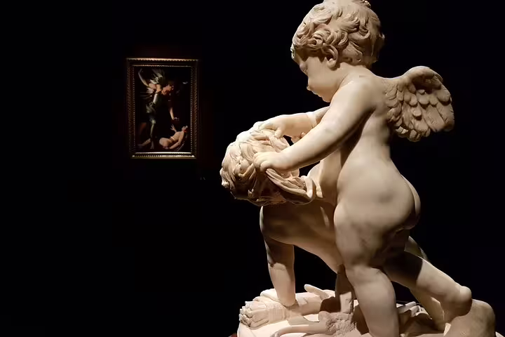 Marble statue of cherubs in Kunsthistorisches Museum, showcasing exquisite craftsmanship and artistic beauty.