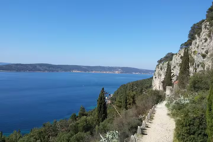 Panoramic Adriatic Sea view from Marjan Park hiking trail in Split, with cliffs and coastal path ahead