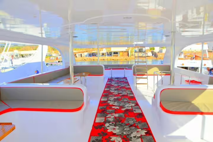 Bright upper deck seating on Marsa Alam snorkel boat, relaxing ride to Marsa Mubarak dugong and turtles