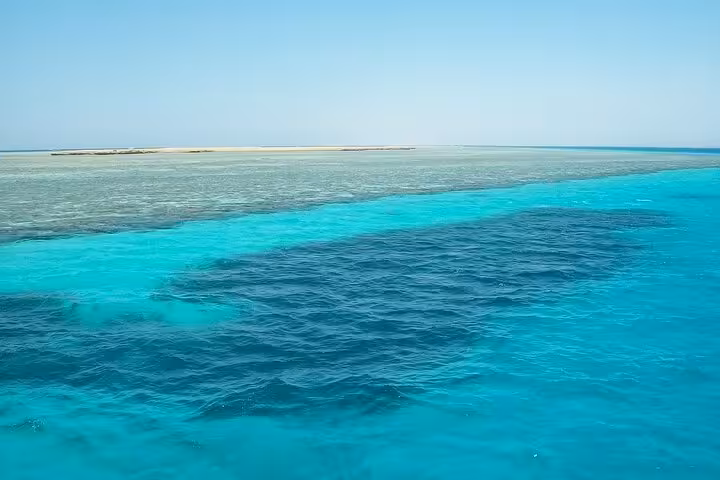 Turquoise Red Sea lagoon and reef at Marsa Mubarak near Marsa Alam, full-day snorkeling boat trip with lunch
