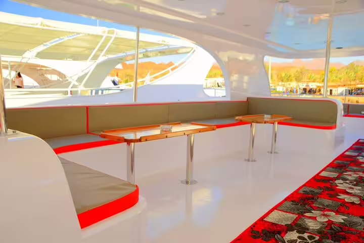 Spacious boat lounge seating on Marsa Mubarak snorkeling day trip in Marsa Alam for dugong and turtles