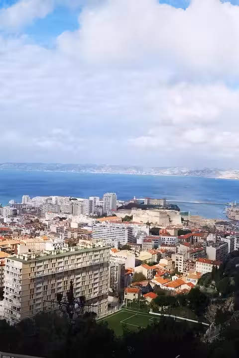 Panoramic Marseille coastline and city skyline from Notre-Dame de la Garde on a shore excursion tour
