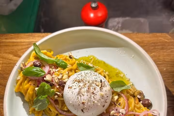 Local chef cooking class in Marseille featuring fresh pasta with burrata, basil, olive oil and nuts