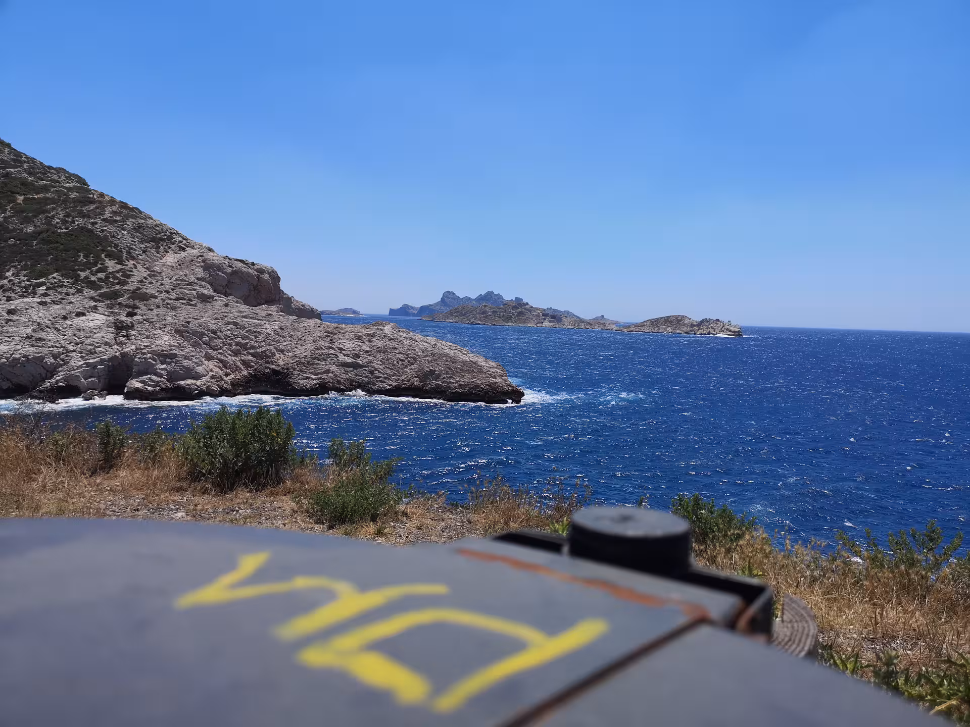 Scenic Marseille half-day city tour view of Frioul Islands and Mediterranean coast from rocky lookout