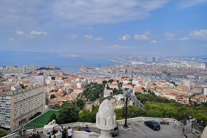 Panoramic Marseille harbor view from hilltop lookout, scenic stop on private Aix en Provence and Cassis tour