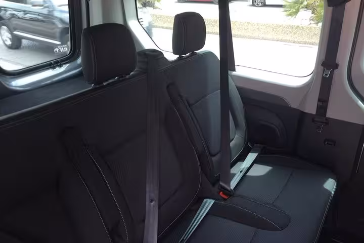 Comfortable second-row bench seat with seatbelts in private Marseille to Nice airport transfer minivan
