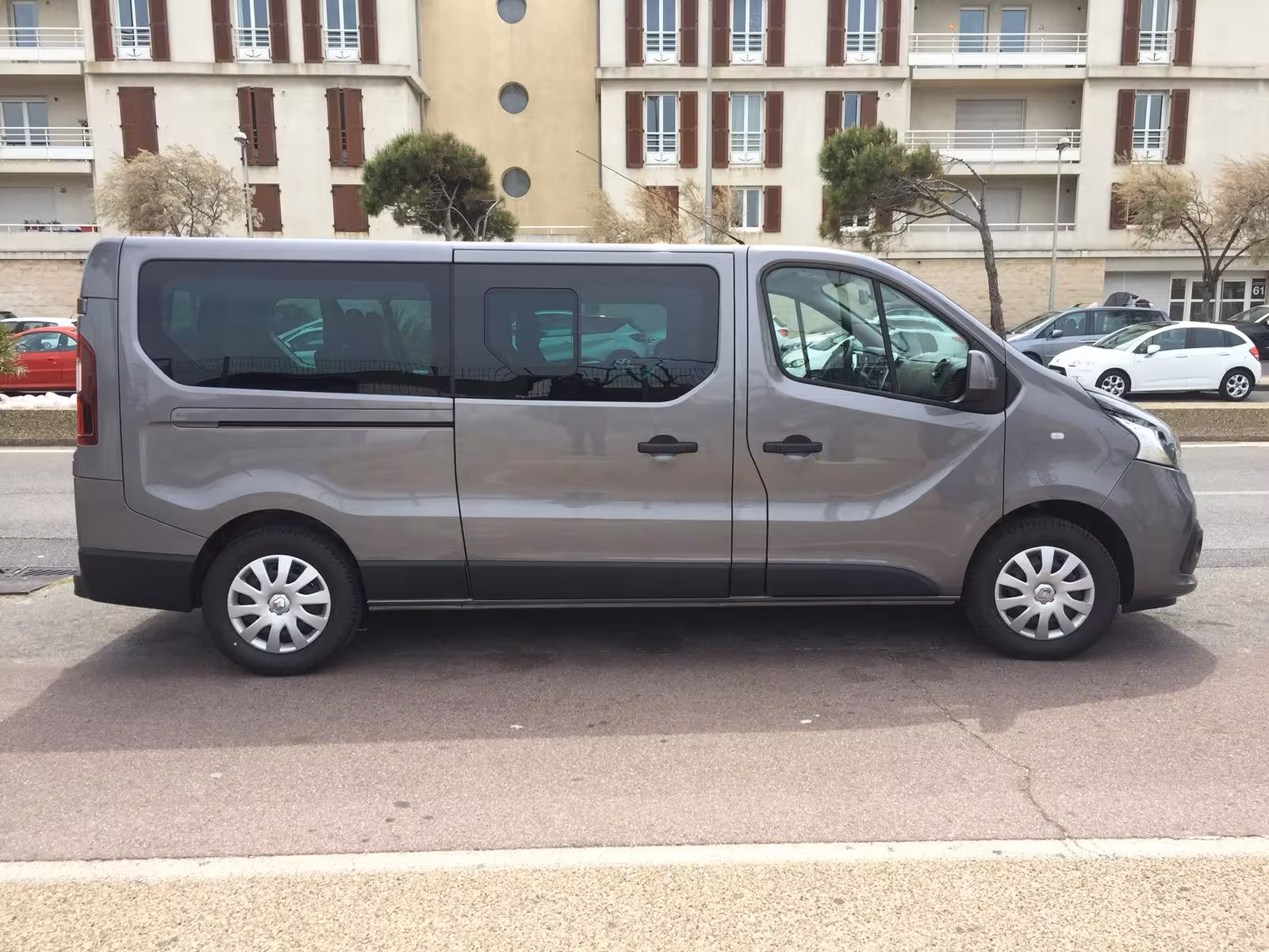Side view of shuttle van for Marseille Provence Airport transfer with door-to-door service to port, station and hotel