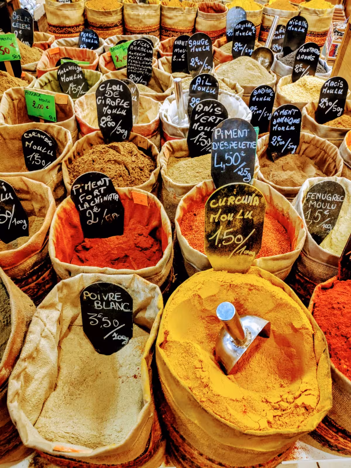 Colorful spice sacks at Marseille market, Provence flavors tasting stop on Marseille from all angles 3-day tour