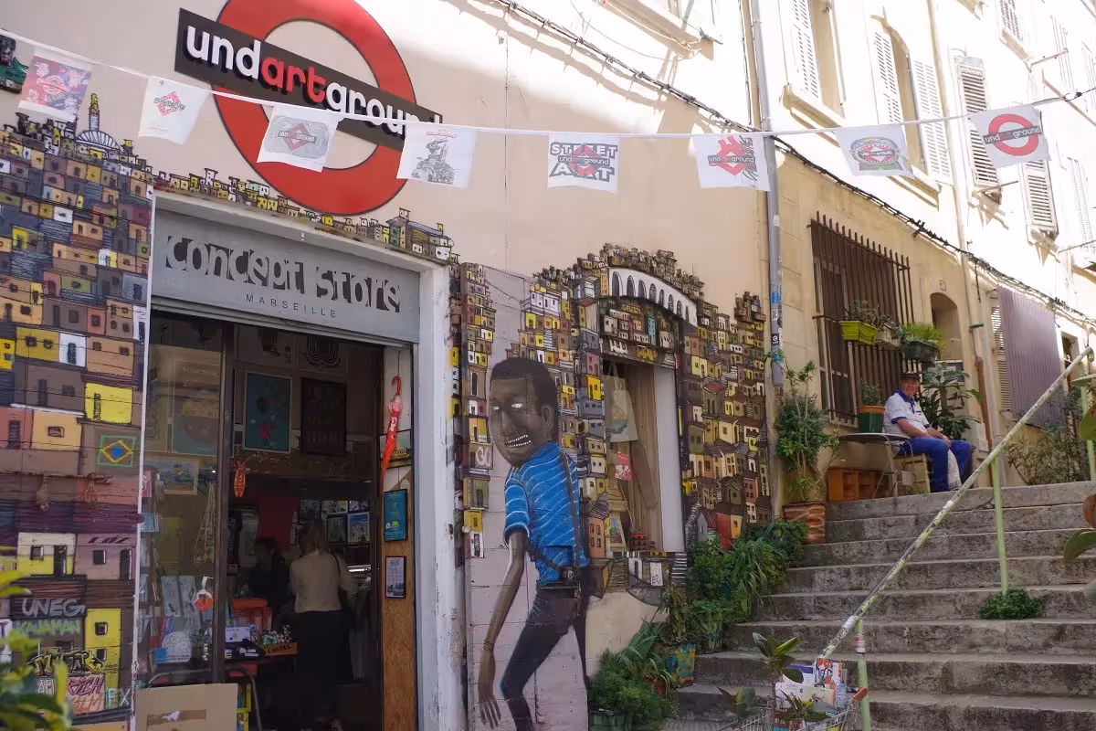 Colorful street art mural by an Old District staircase in Marseille, featured on the craft and wine walking tour