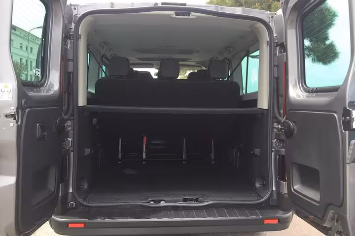 Spacious minivan luggage trunk with rear doors open for Marseille airport, port and hotel transfers
