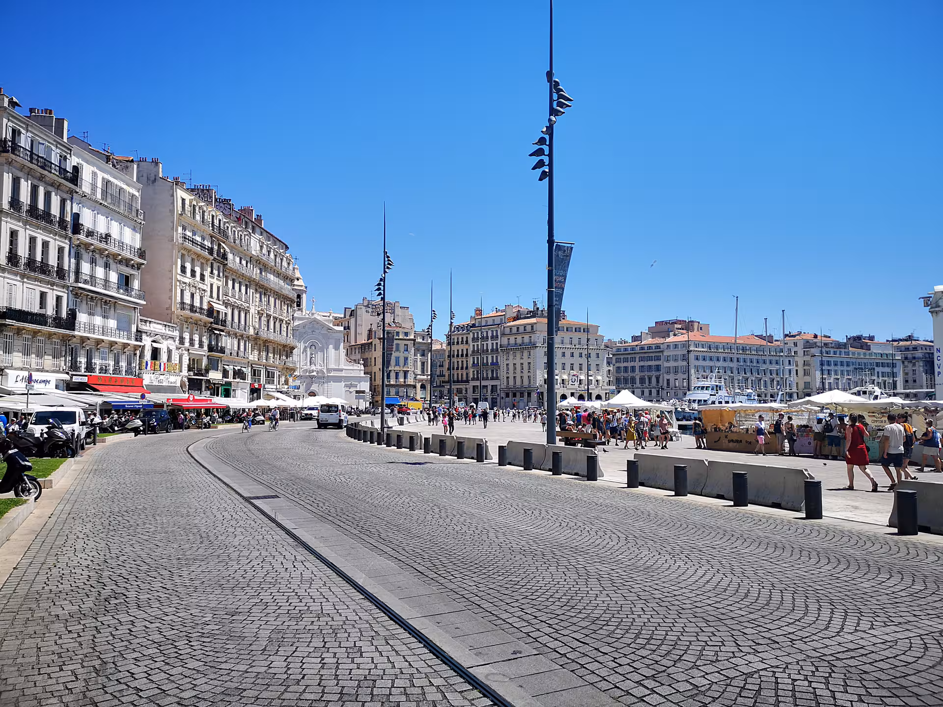 Vieux-Port Marseille waterfront promenade and market stalls, highlight of a half-day city tour sightseeing