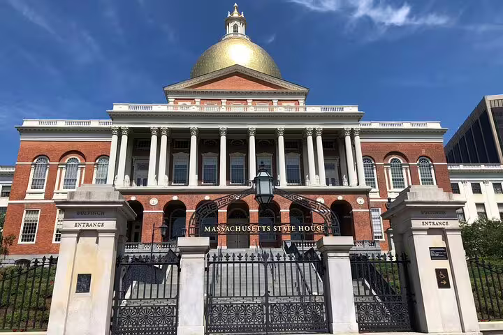 Massachusetts State House with gold dome and brick facade, Boston historic landmark