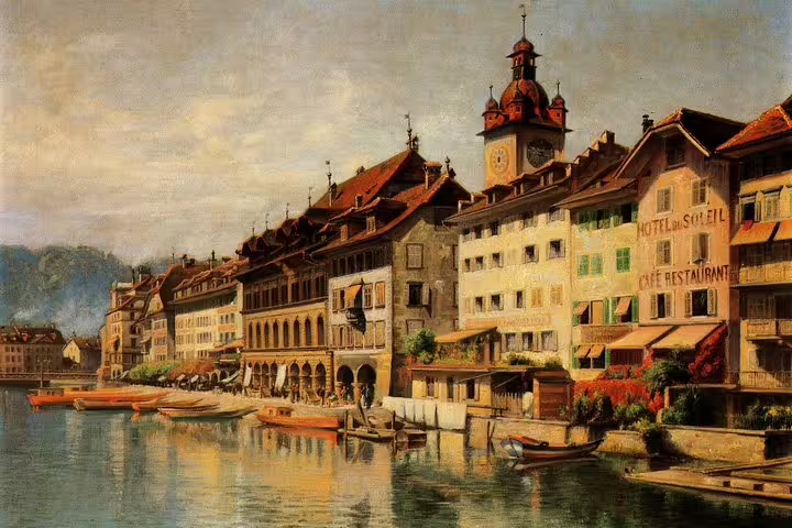 Charming view of Lucerne's medieval architecture along the waterfront, showcasing its picturesque beauty.