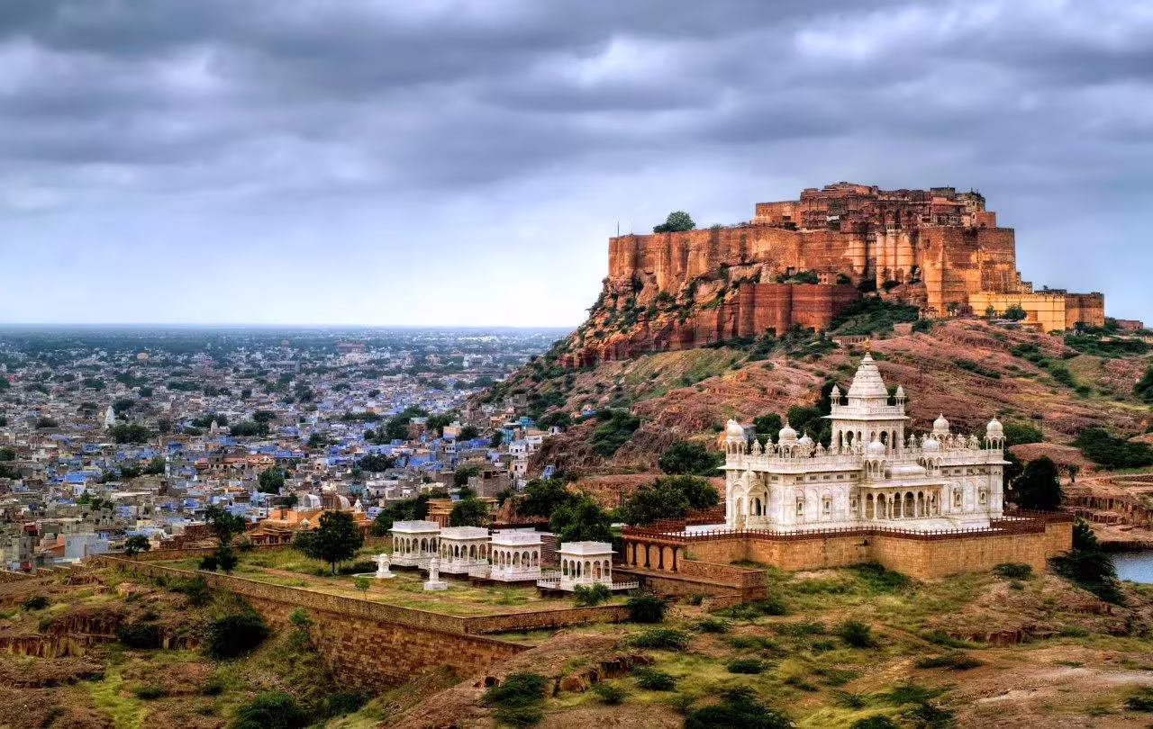 Majestic view of Mehrangarh Fort overlooking the blue city of Jodhpur, highlighting Rajasthan's rich heritage.
