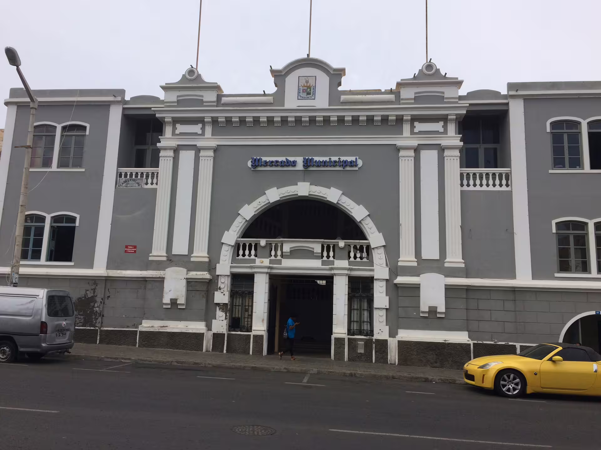 Historic Mercado Municipal building in Mindelo, São Vicente, showcasing colonial architecture on a full-day shore excursion.